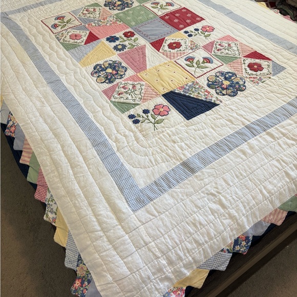 Patchwork Floral Quilt with White and Blue Accents
